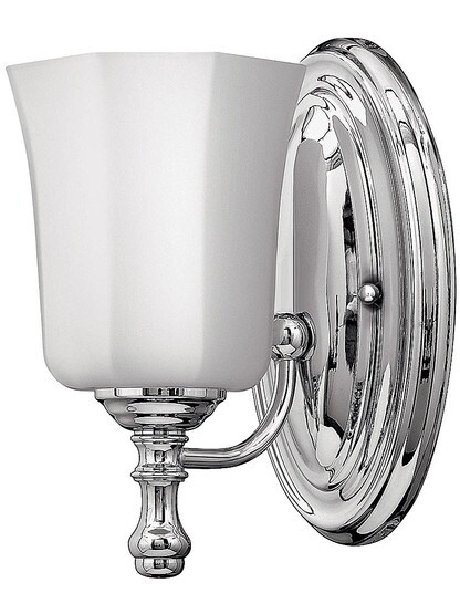 Shelly Single Sconce with Opal Glass Shade in Polished Chrome.